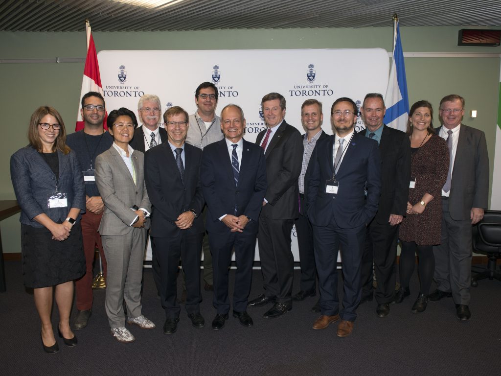 group shot includes Meric Gertler and John Tory