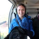 Seated in bush plane wearing ear protectors