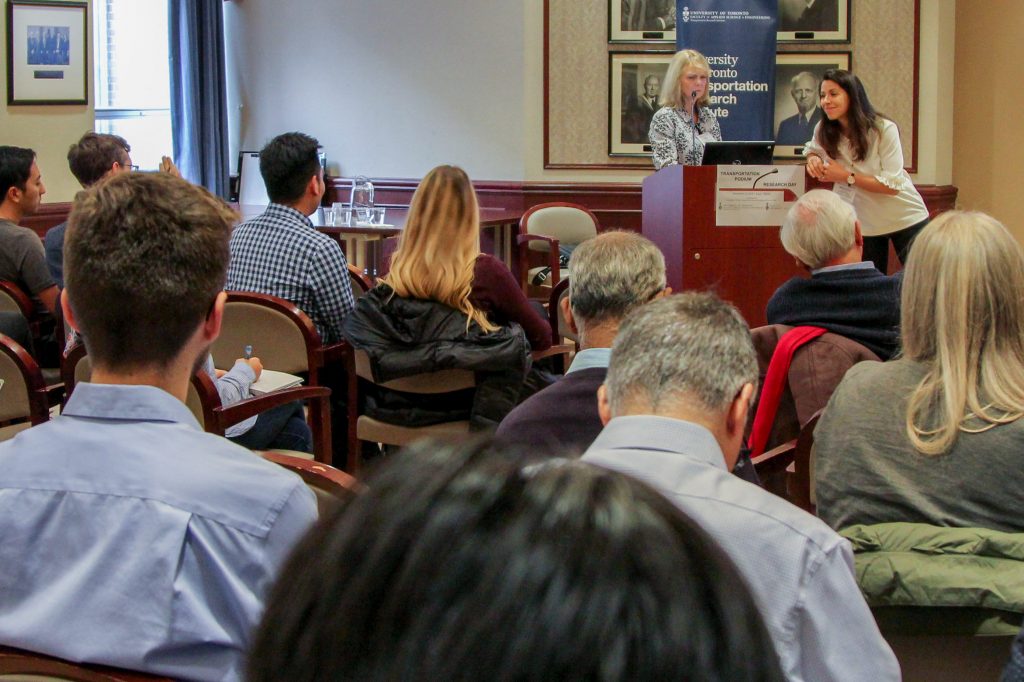 Professor listens to audience question