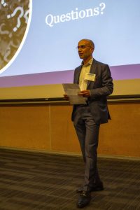 speaker in front of screen
