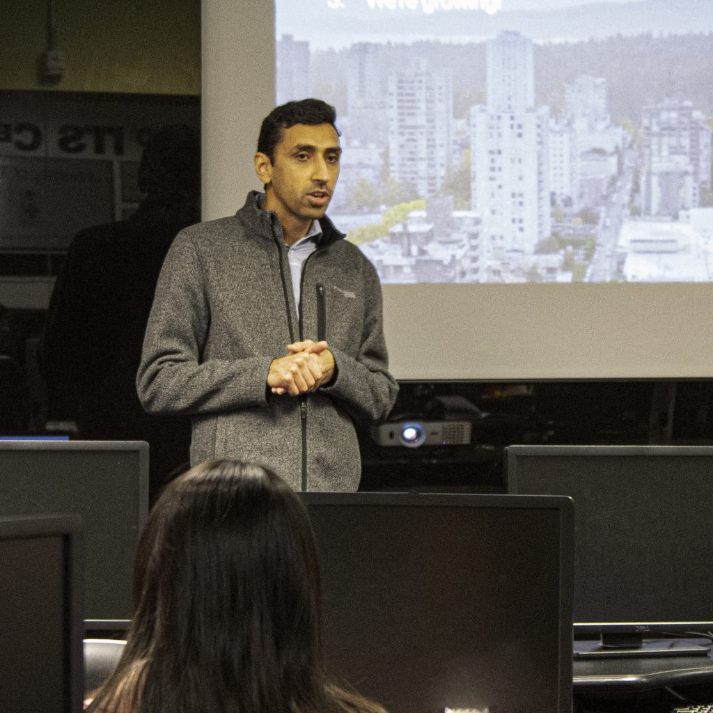 speaker in front of screen image