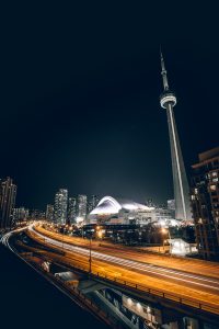 Night shot of QEW, CN Tower and SkyDome