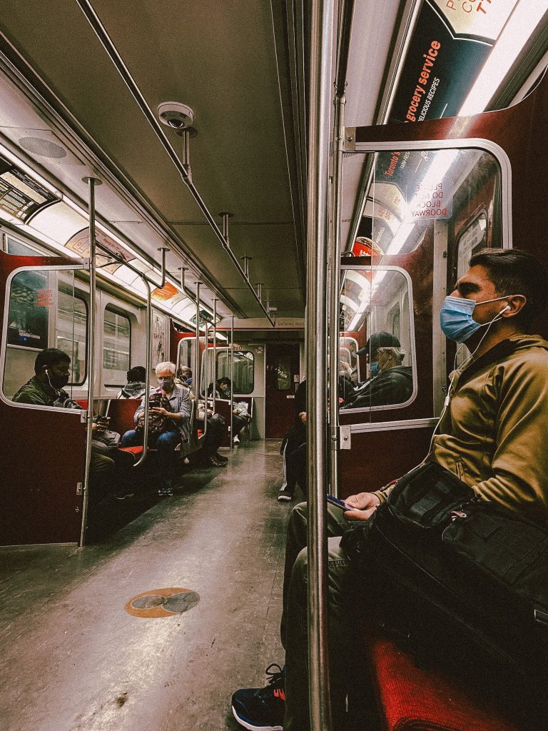 TTC subway car with masked passengers during COVID